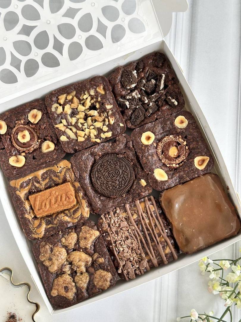 Gift box of nine assorted brownies with fresh flowers, Hyderabad