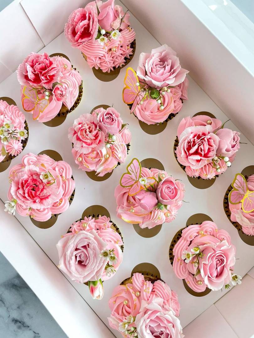 Buttercream cupcakes crowned with fresh roses in a gift box, Hyderabad