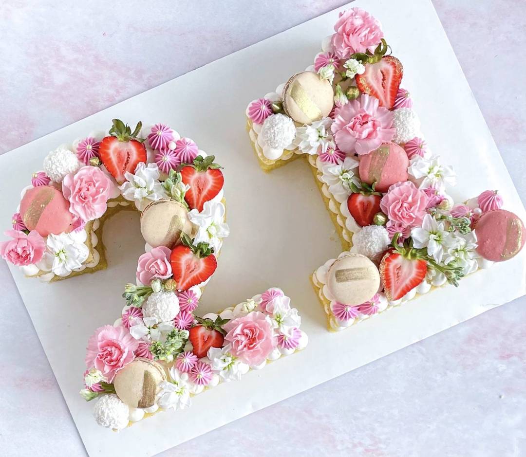 Number 21 cream cake with roses, strawberries and macarons, Hyderabad